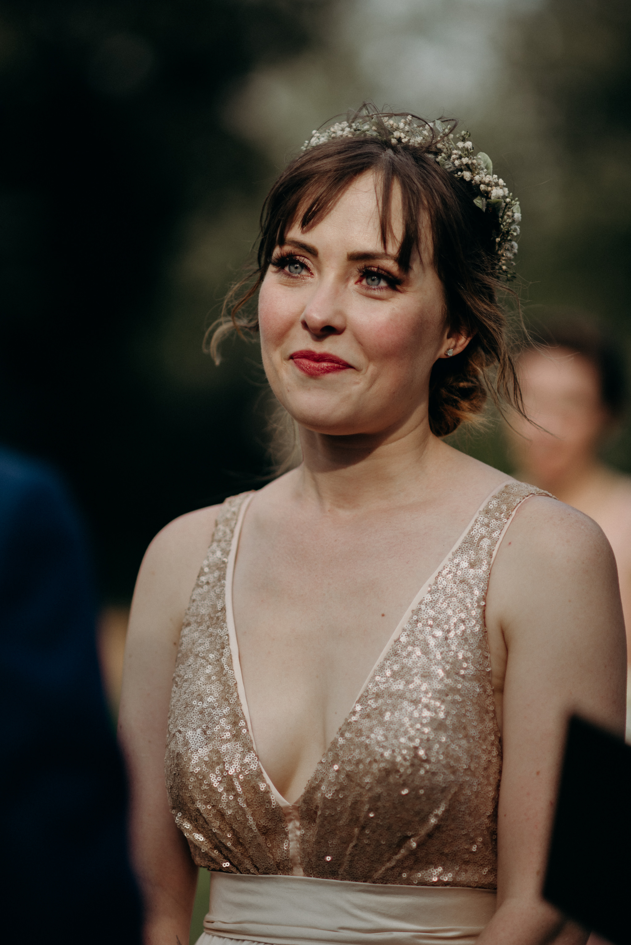 bride smiling during ceremony