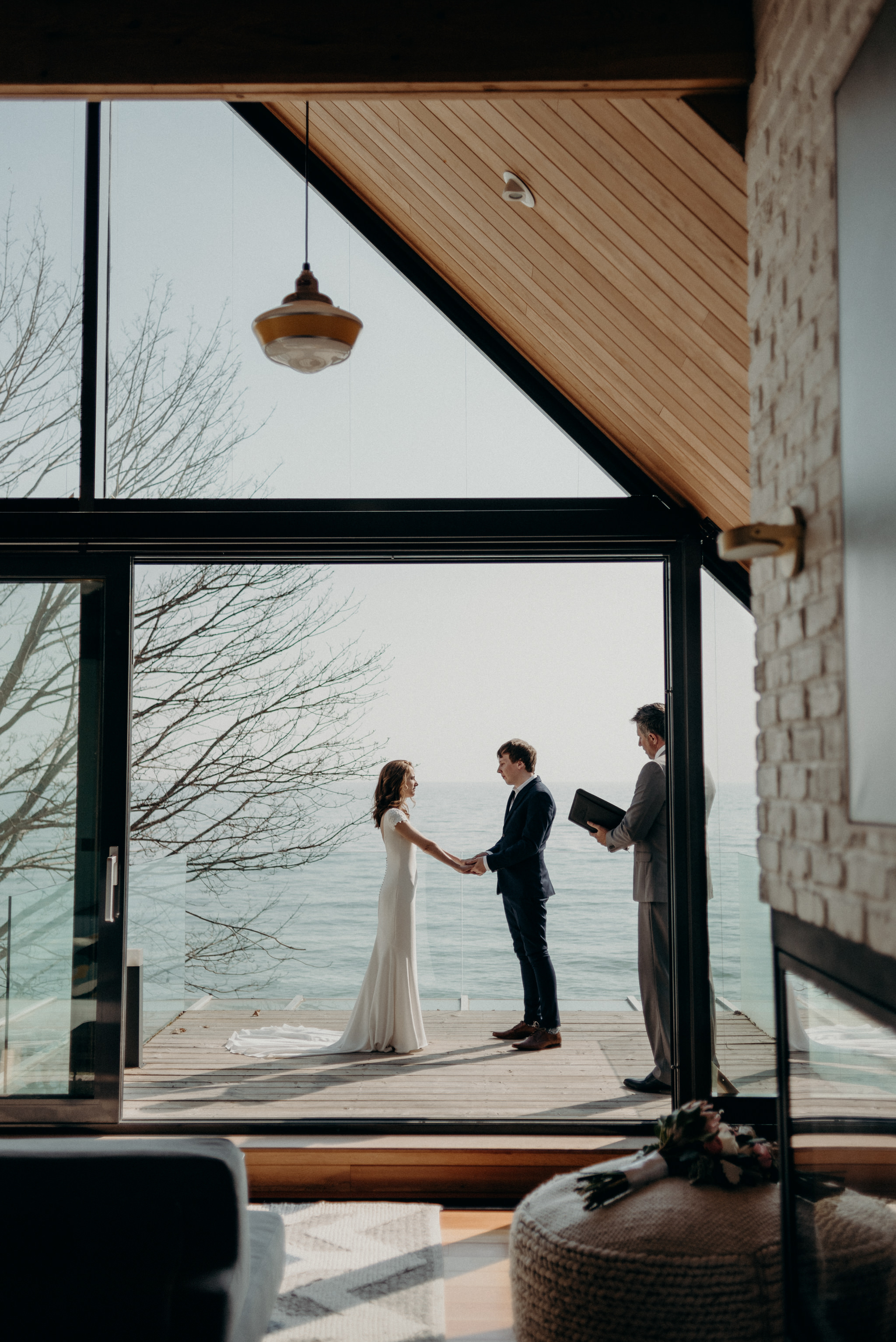 Bride and groom eloping on patio of owner's suite at Drake Devonshire Inn