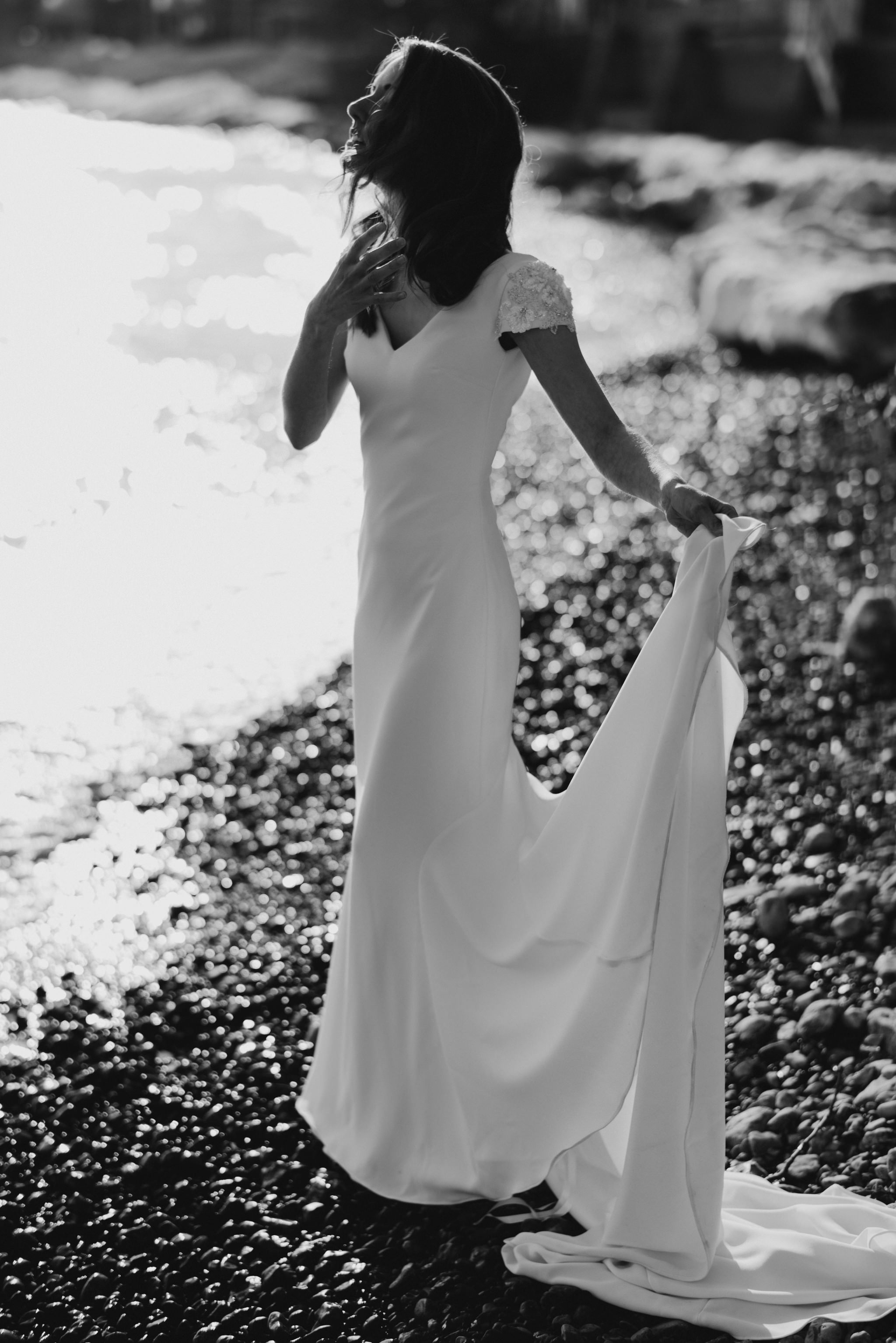 bride on beach at sunset