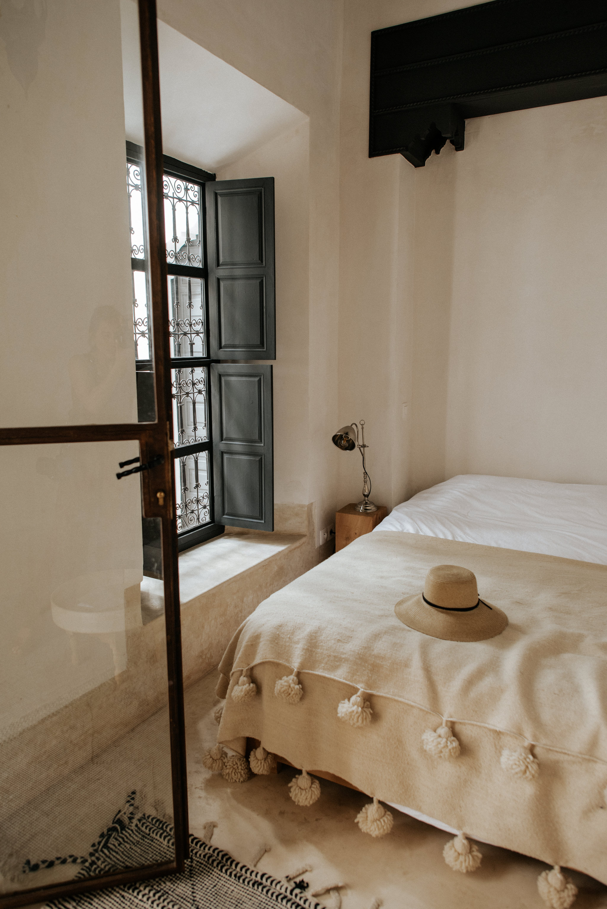 Clean minimalist bedroom at Riad 42 in Marrakech