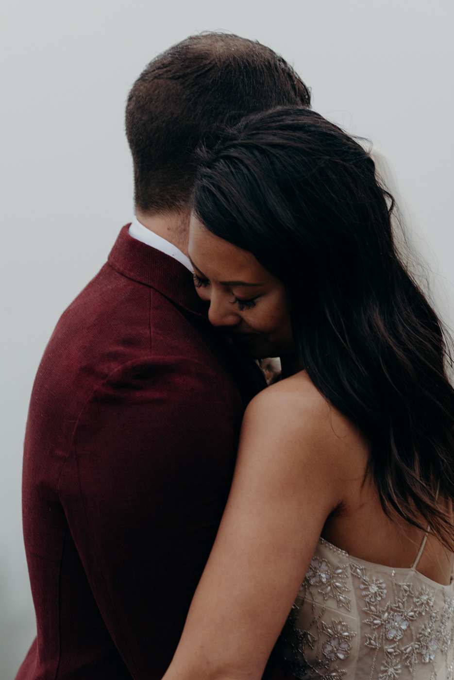 bride hugging groom