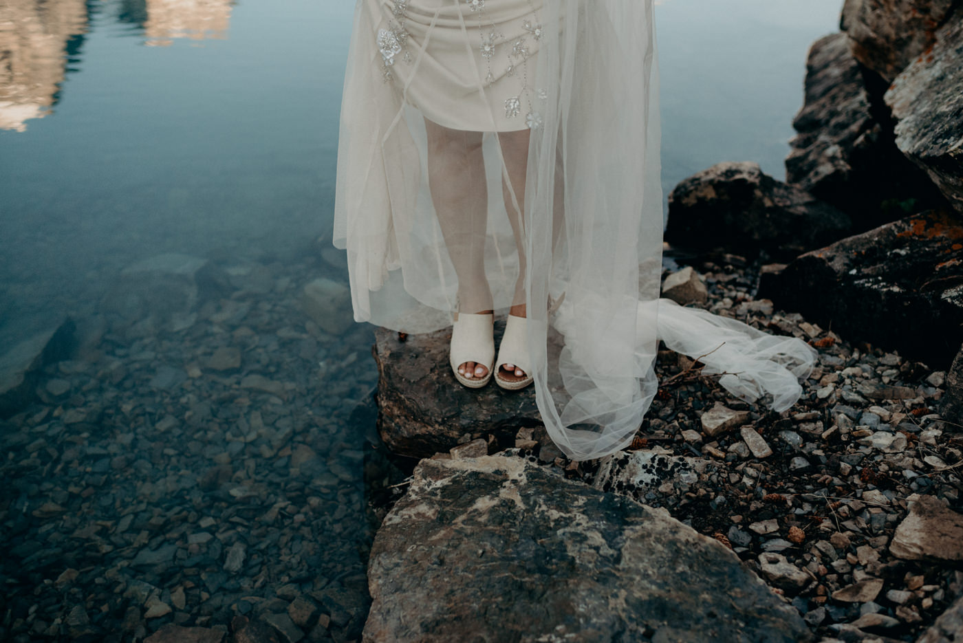 bride wearing Tom canvas wedges for mountain elopement