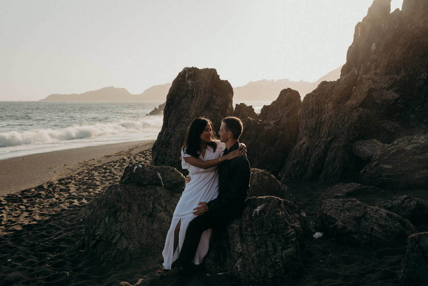 Couple on beach at sunset