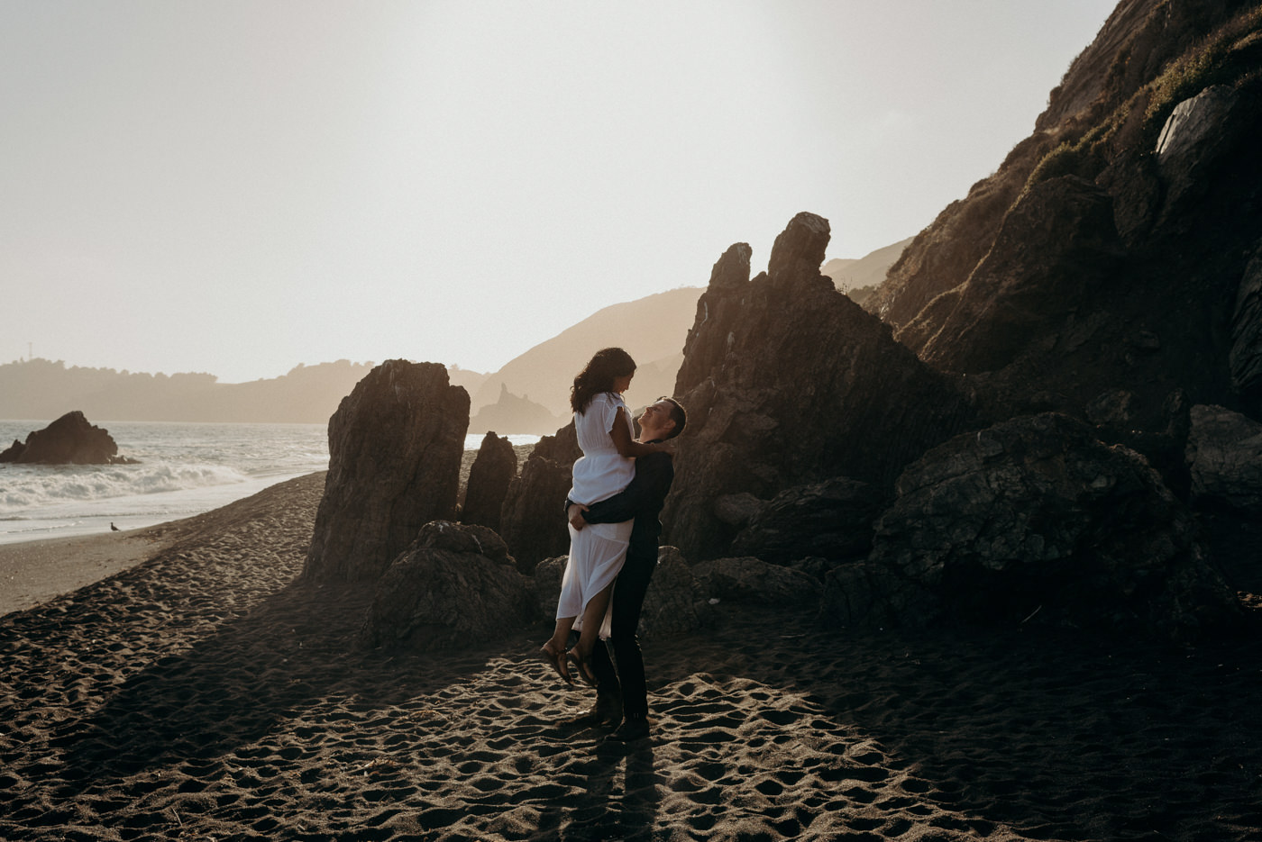 Couple walking on the beach, Marin Headlands