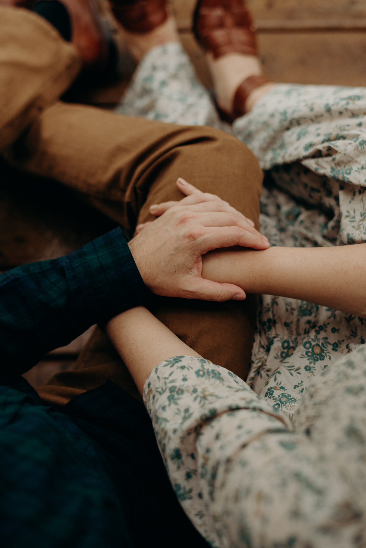 Close up of couple holding hands