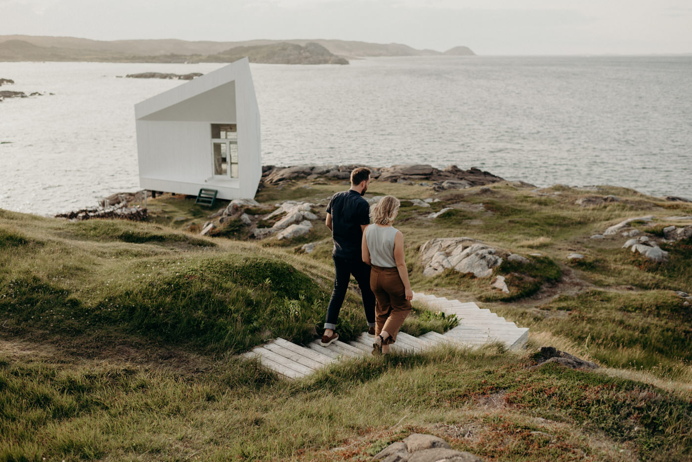 Couple exploring Fogo island and visiting Squish Studio