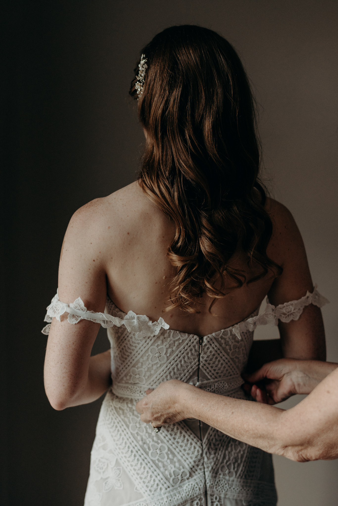 bride getting ready in rue de seine wedding dress