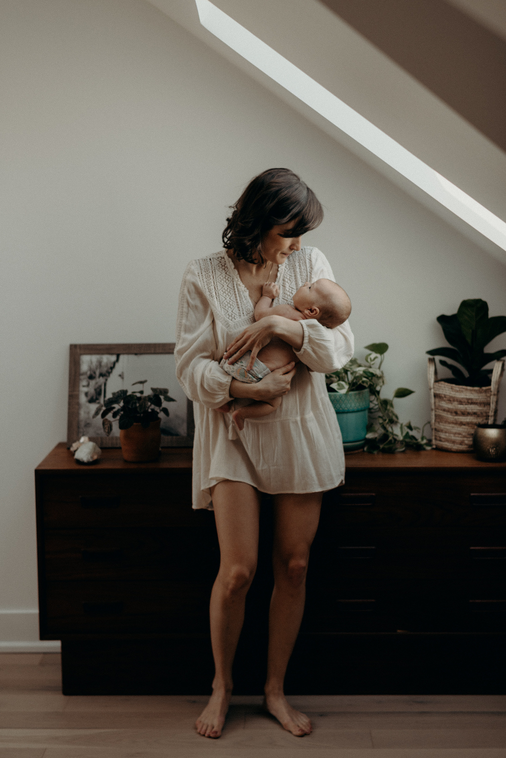 mother holding newborn baby