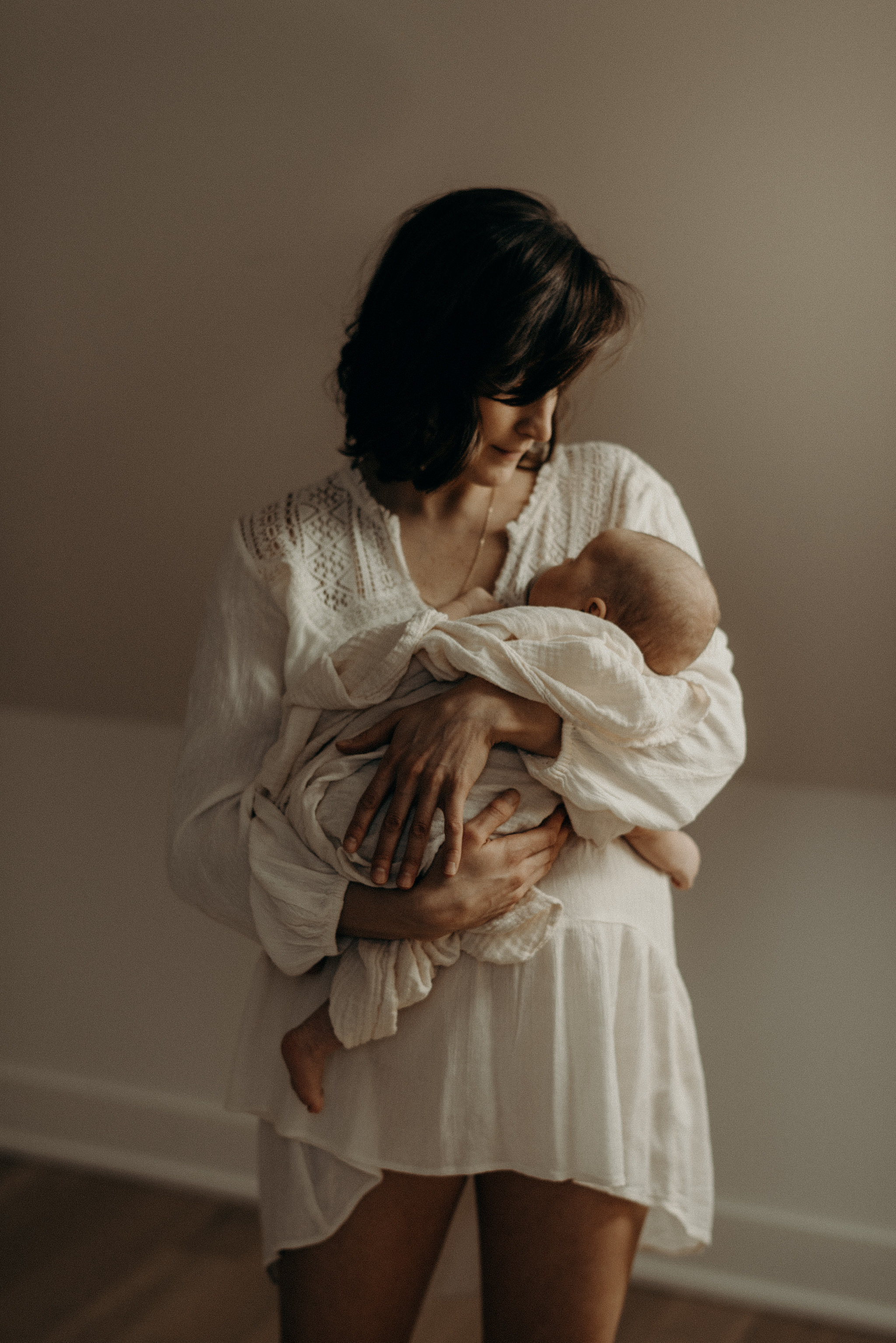 mother and newborn baby at home