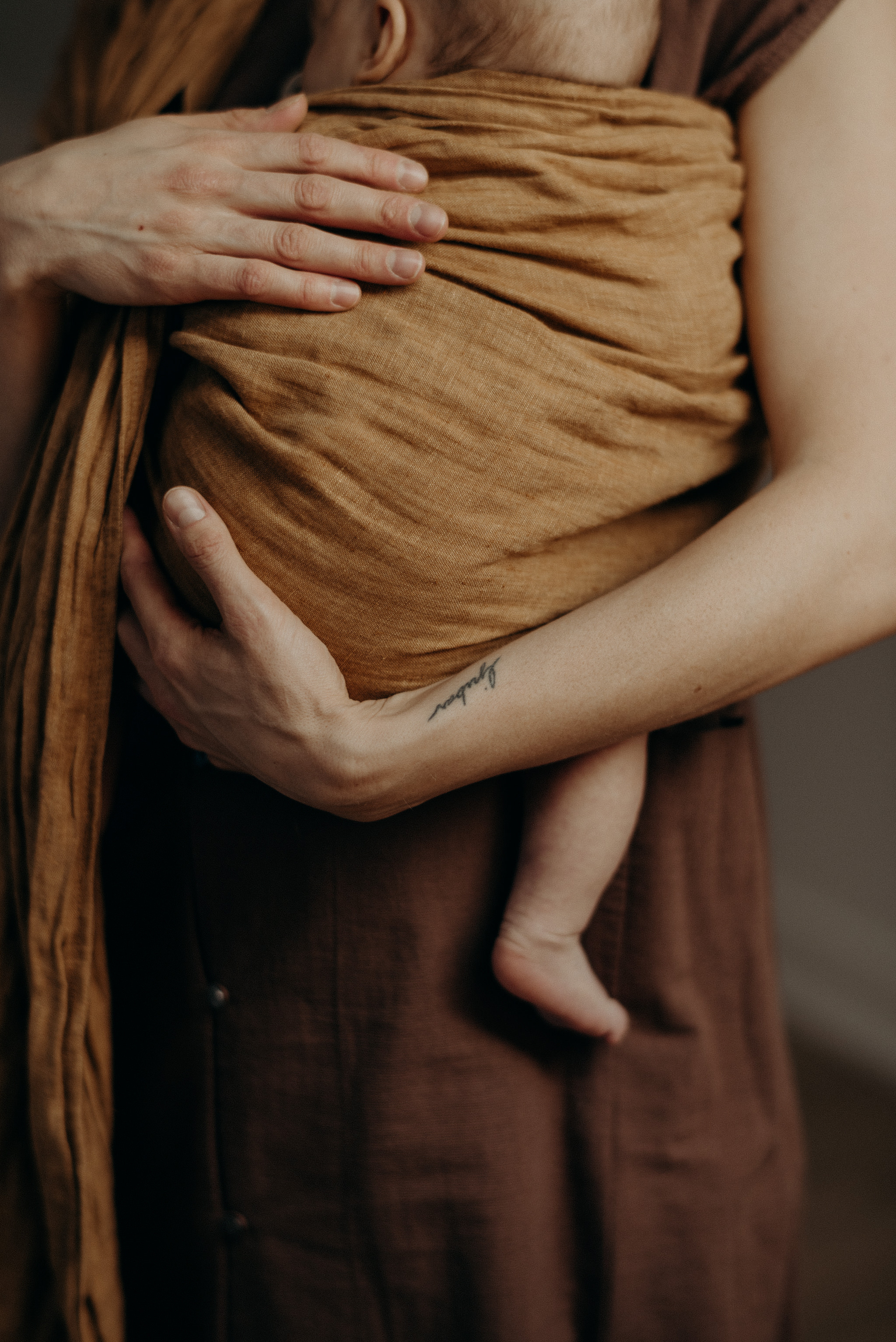 mother with baby in sling