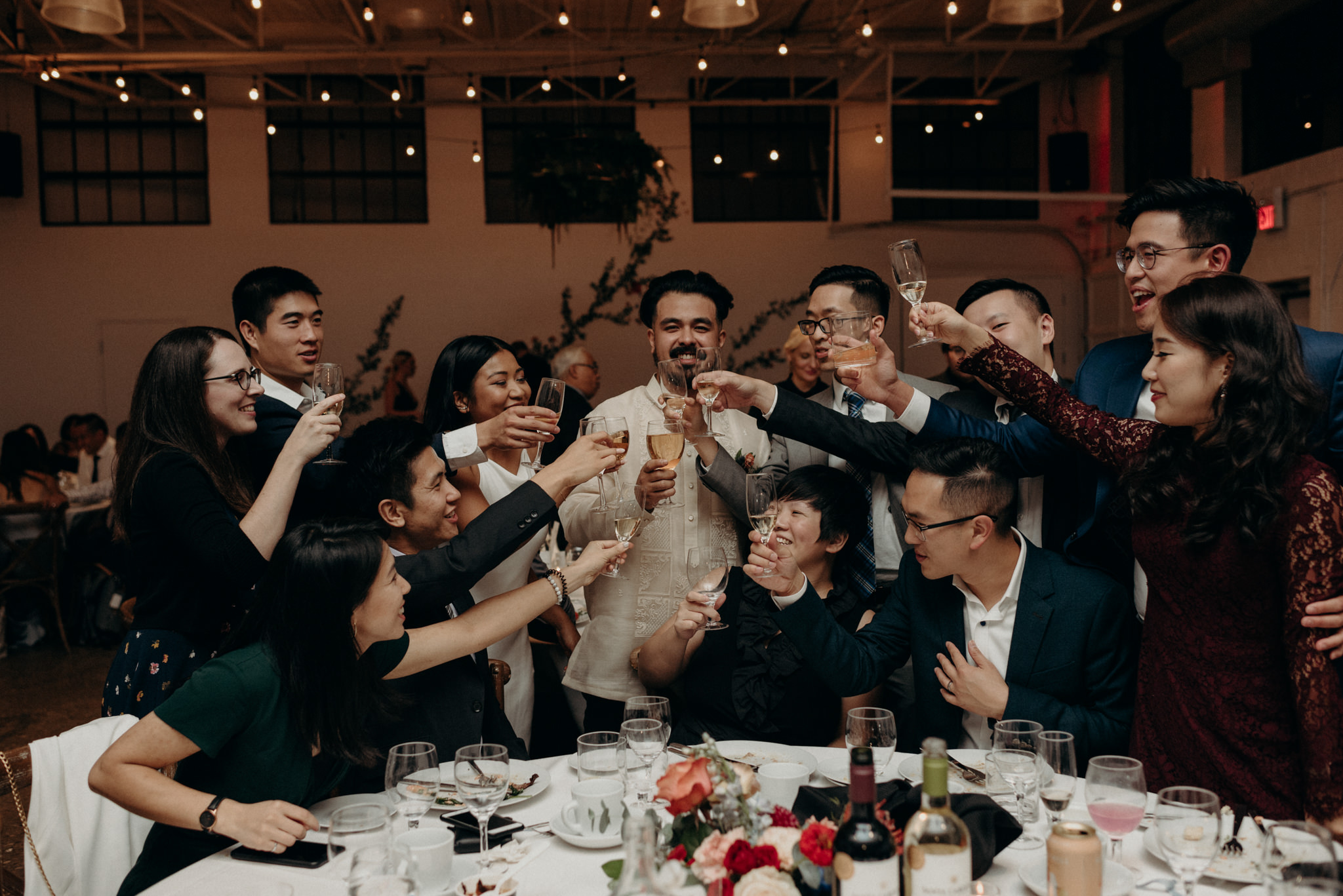 guests and couple drinking at reception