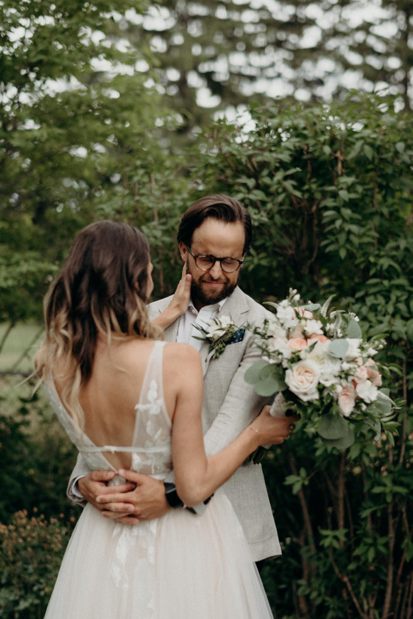 emotional groom during first look