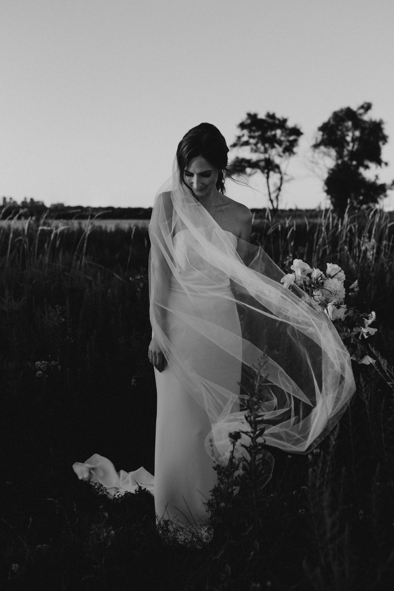 Bride with veil in wind at Humber Bay