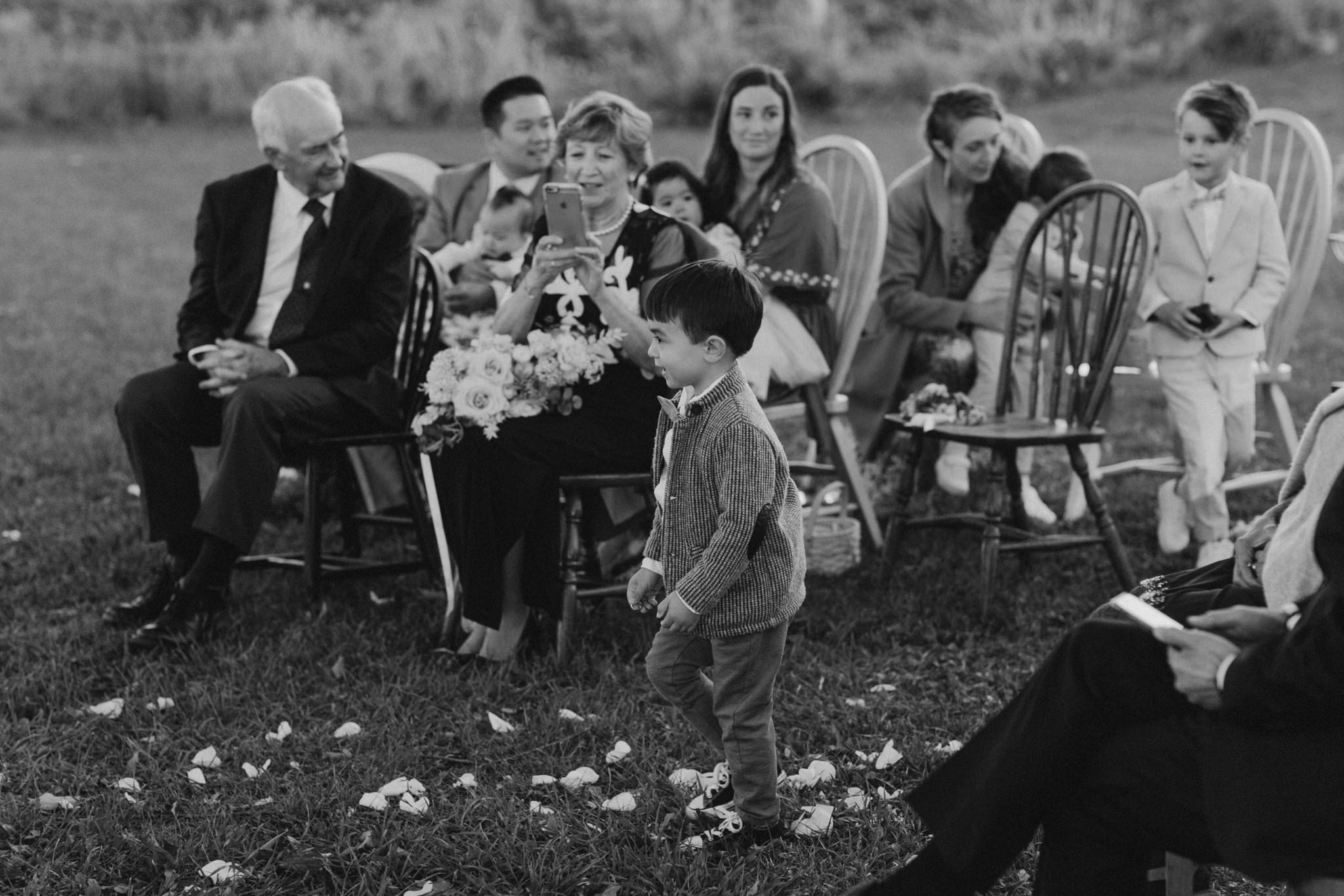 ring bearer walking down aisle