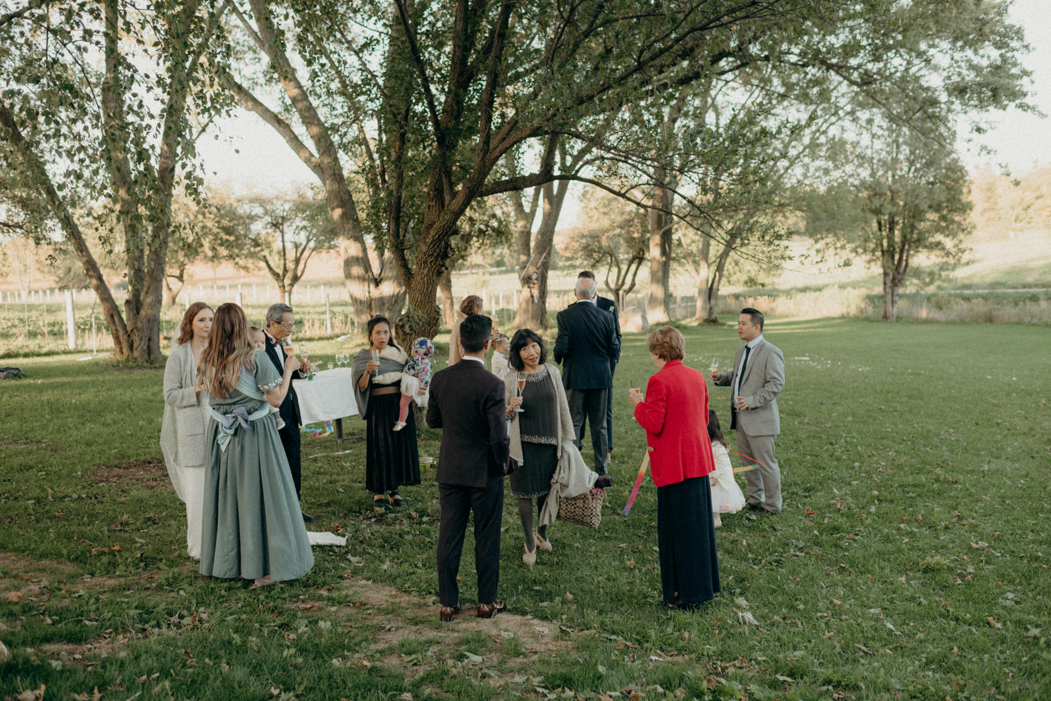 guests mingling and having drinks outdoor