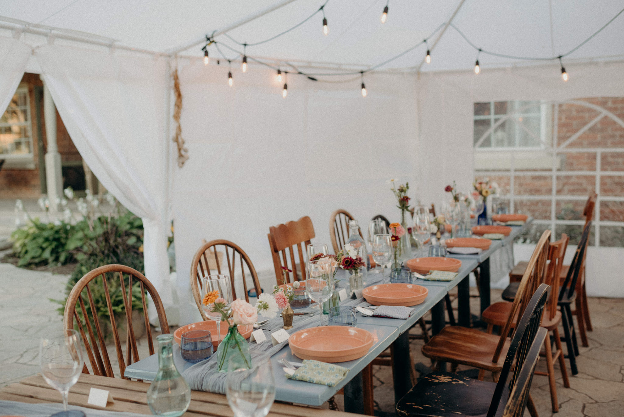 Intimate tent reception, colourful table setting. Good Family Farms Wedding.