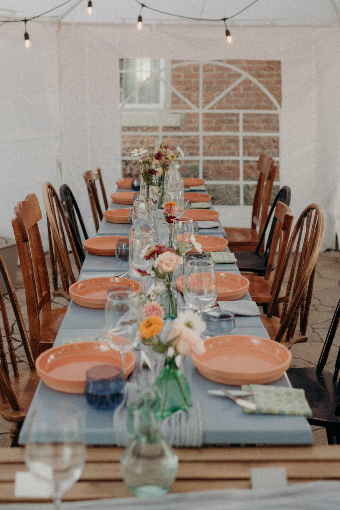 Intimate tent reception, colourful table setting. Good Family Farms Wedding.