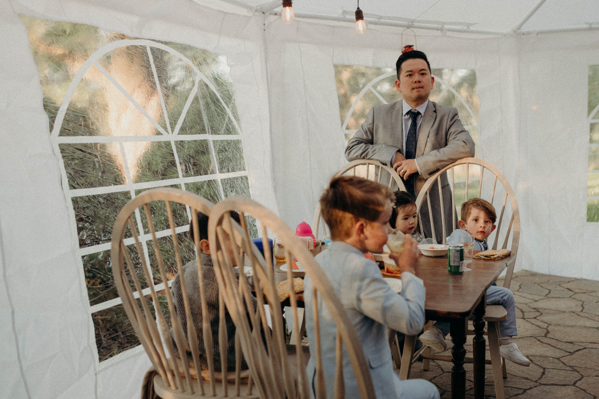 Kids table at outdoor tent reception