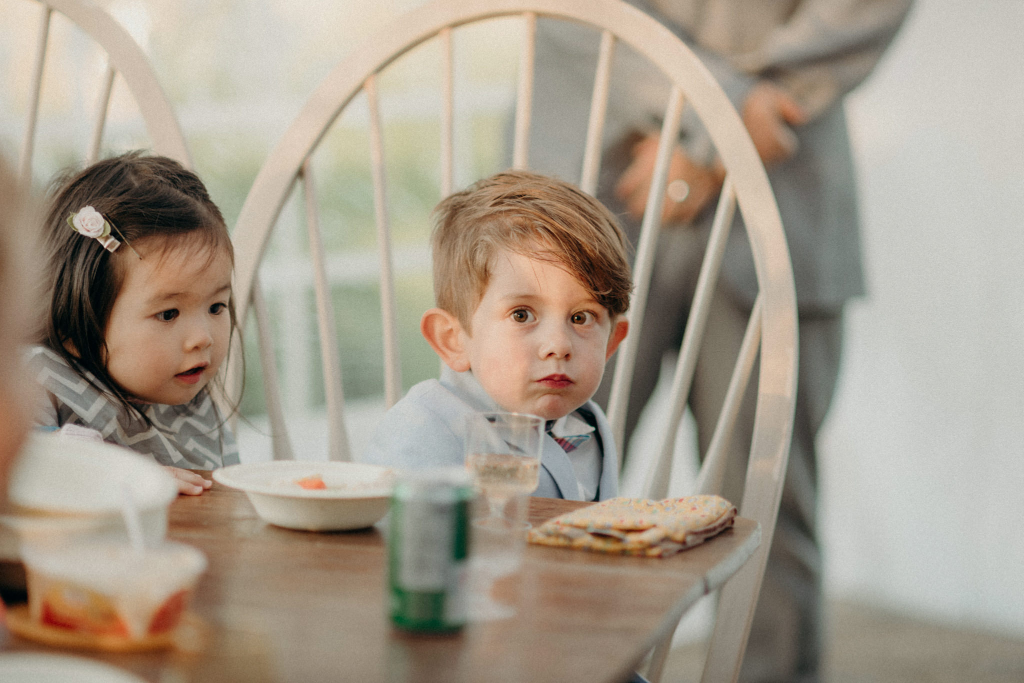 kids sitting at table at wedding reception