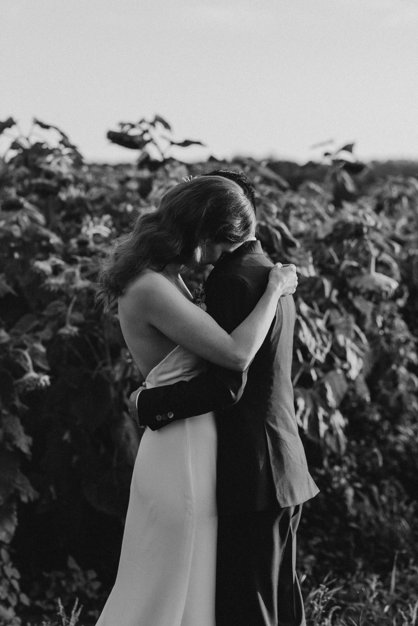 Wedding portraits in a field at sunset. Good Family Farms wedding.