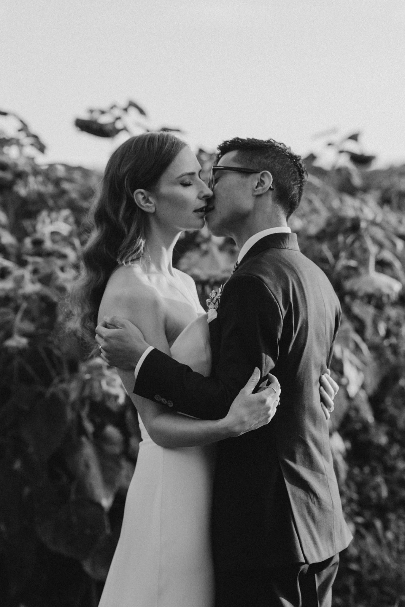 Wedding portraits in a field at sunset. Good Family Farms wedding.