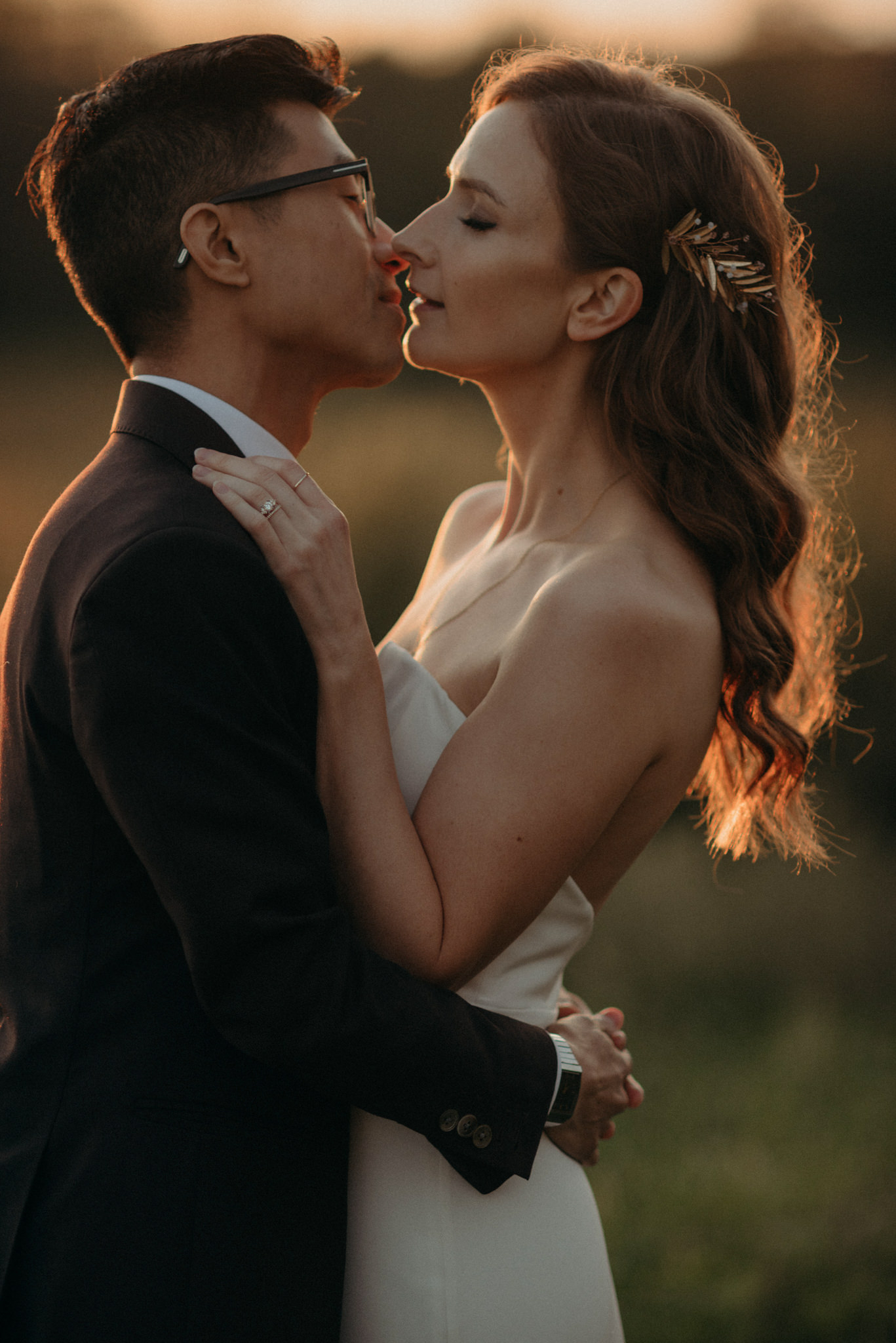 Wedding portraits in a field at sunset. Good Family Farms wedding.