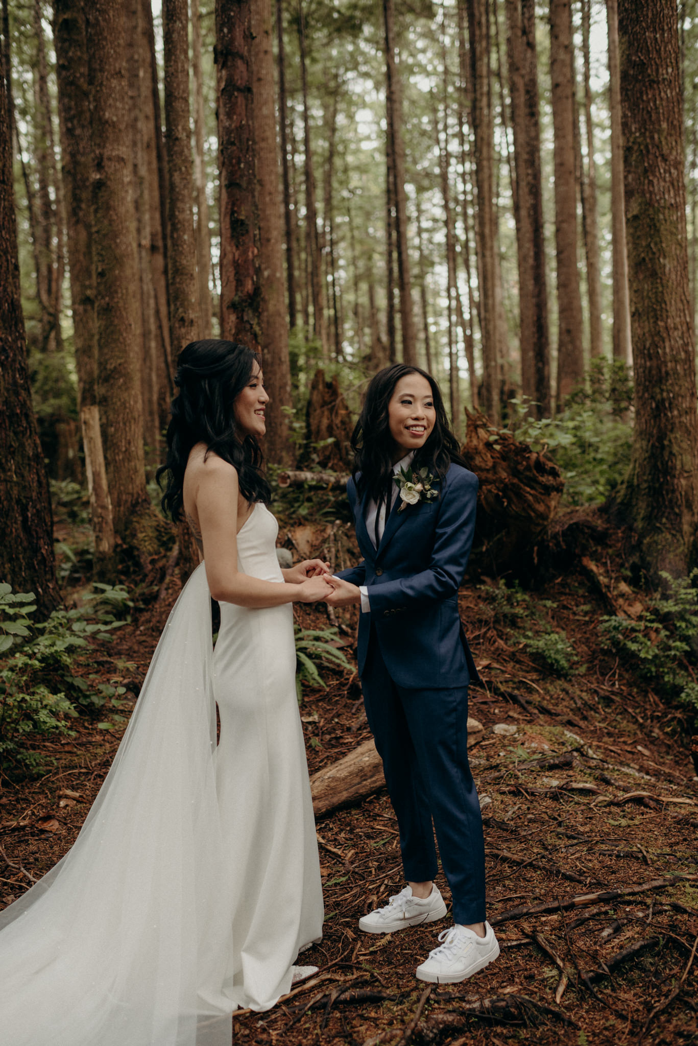 Same sex elopement ceremony in forest in Tofino