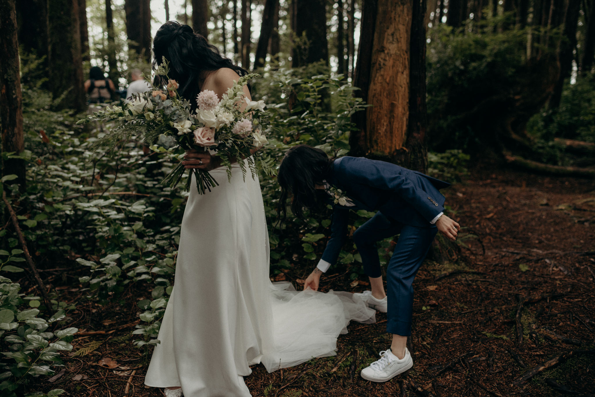 bride arranging dress