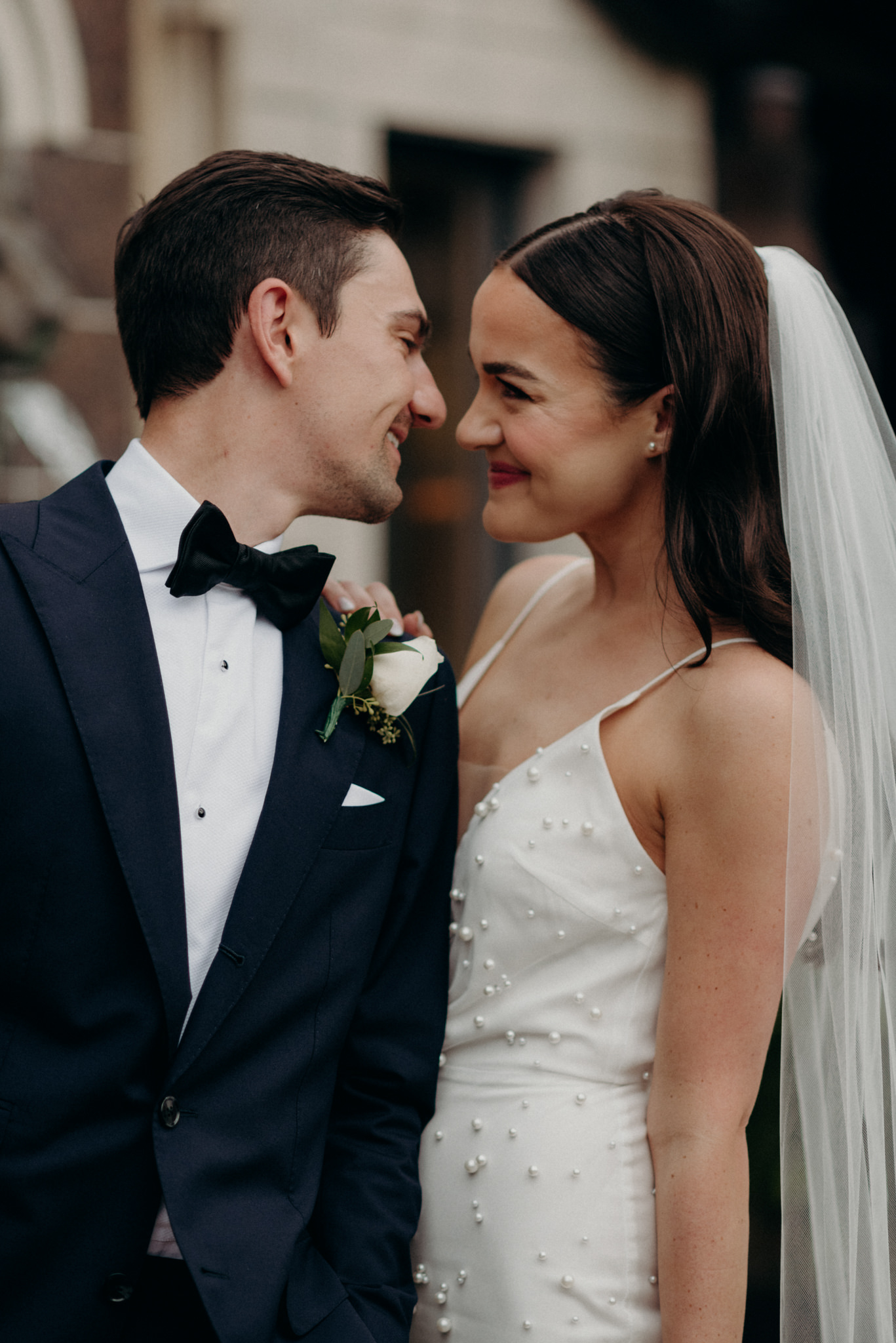 bride and groom smiling