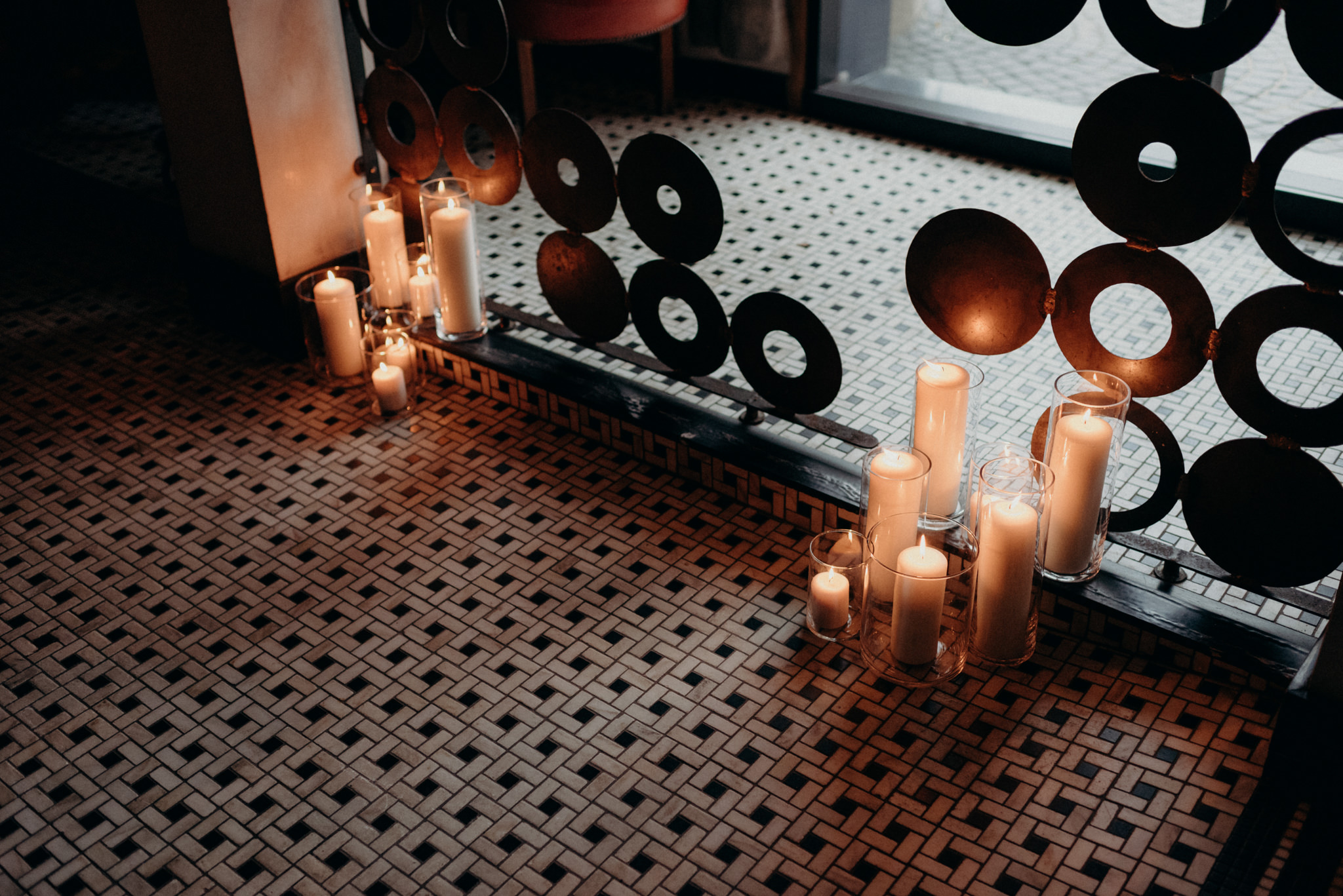 candles on tiled floor