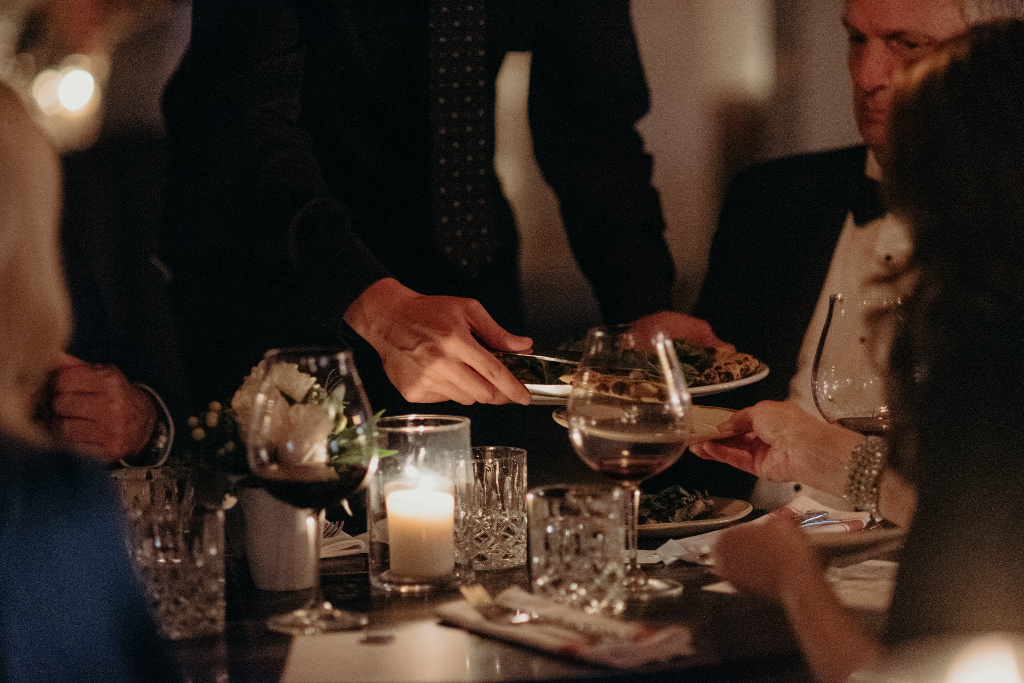 serving food to guests at wedding