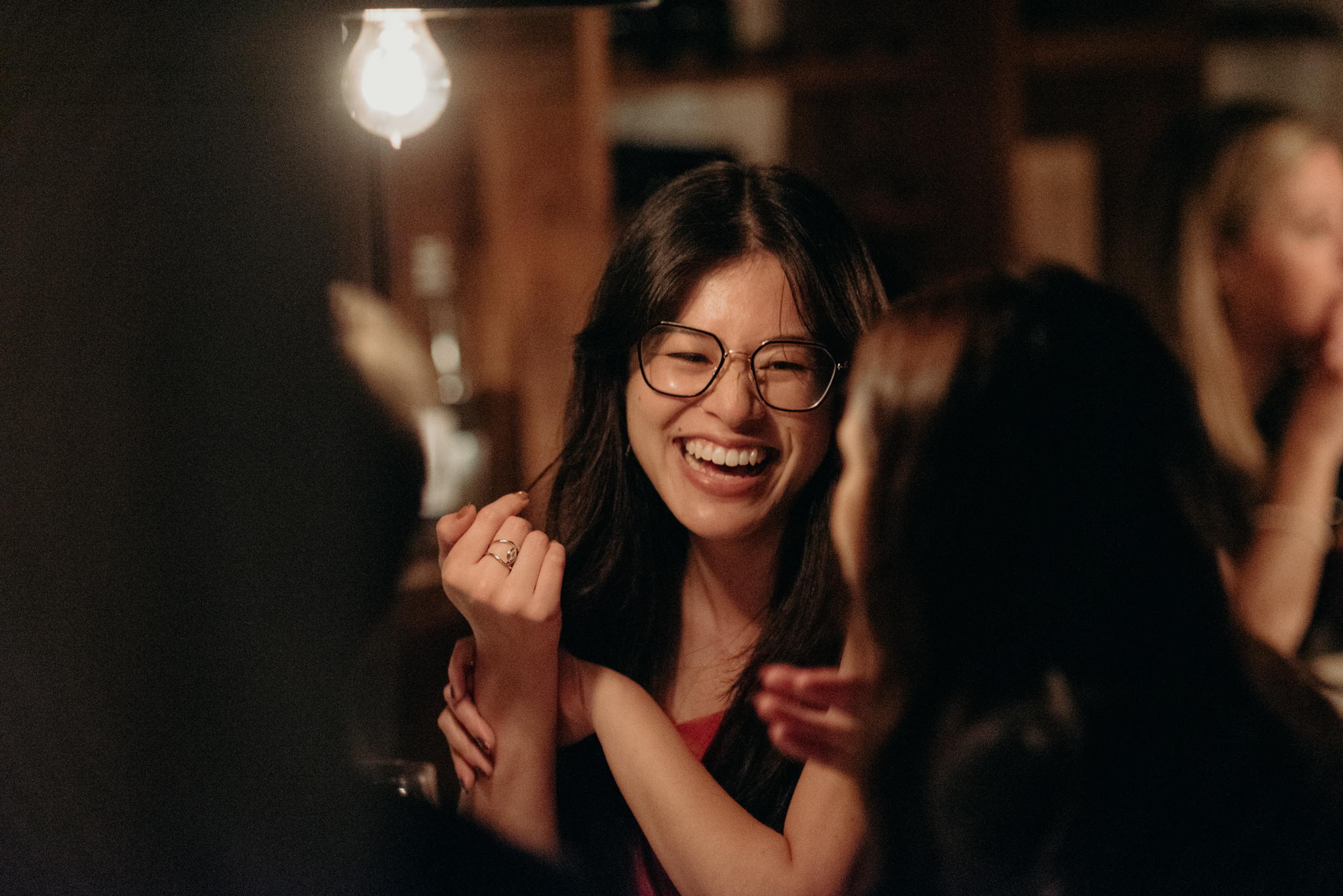 guest laughing at wedding reception