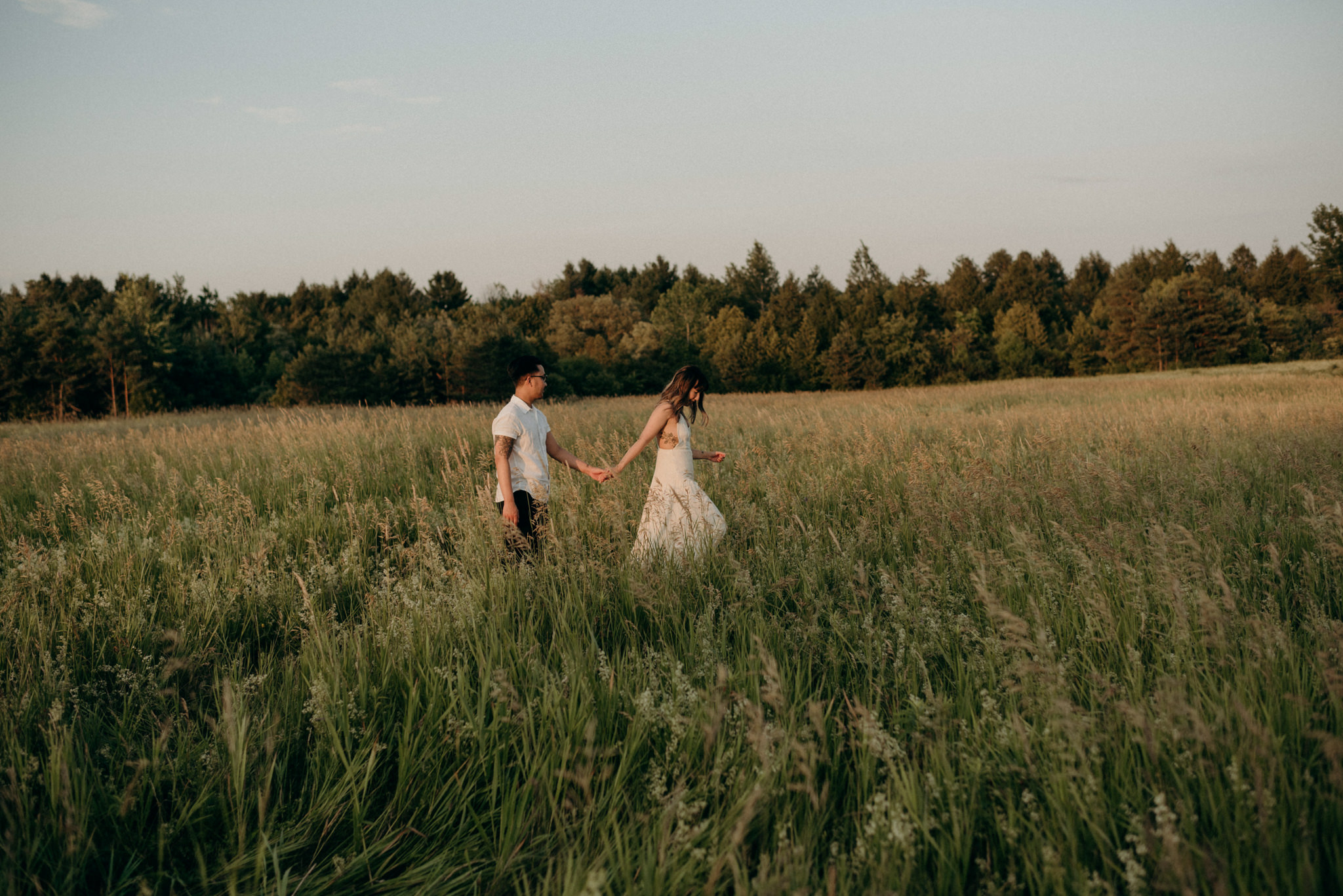 sunset couple session in a field