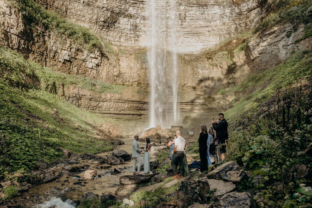 Intimate Waterfall Wedding Ceremony at Sunrise