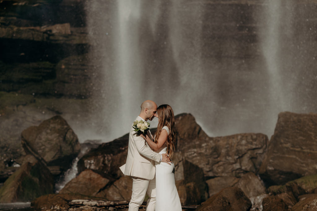 Intimate Waterfall Wedding Ceremony at Sunrise