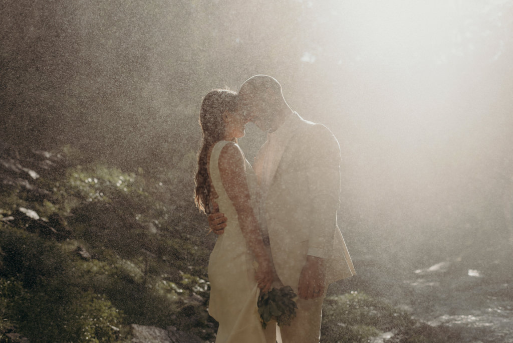 Intimate Waterfall Wedding Ceremony at Sunrise