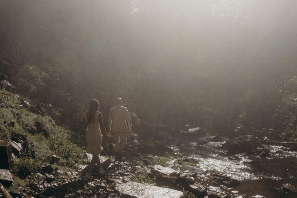 Intimate Waterfall Wedding Ceremony at Sunrise